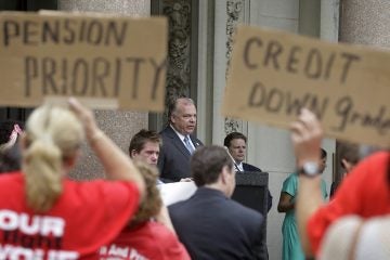  N.J. Senate President Stephen Sweeney addressing union supporters angry at Gov Christie's plan to reduce pension payments. (AP Photo/Mel Evans) 