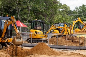  The Big Diggers are 7,092 pound excavators for kids to use. Adults can use a 14,000 pound excavator if they wish. (Brad Larrison/for NewsWorks) 