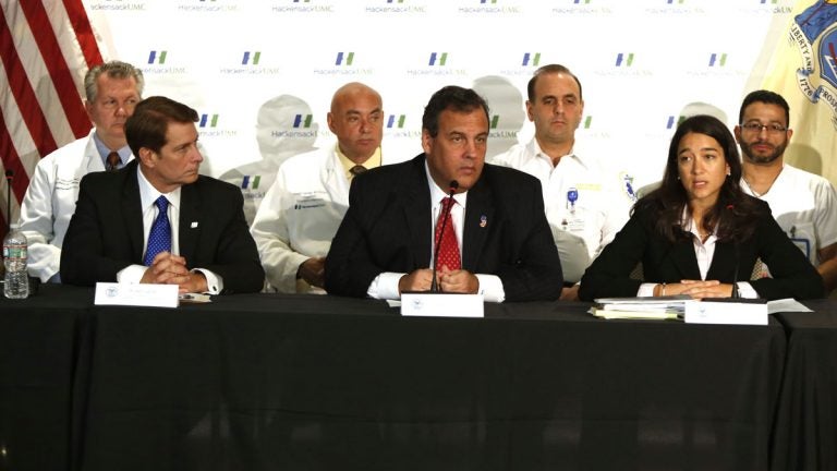  Gov. Chris Christie, center, outlines New Jersey's preparations for the possibility of Ebola. State Health Commissioner Mary O'Dowd, left, said there are no confirmed or suspected cases in the Garden State. (Tim Larsen/Governor's Office)  