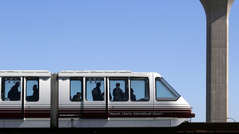 Newark Airport AirTrain Closure Travelers ride on the AirTrain at Newark Liberty International Airport. (AP Photo/Julio Cortez)