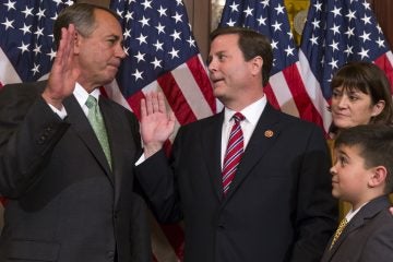  Speaker of the House Rep. John Boehner, R-Ohio, left, poses for a photo with Representative-elect Donald Norcross, D-N.J., center, during a ceremonial swearing-in ceremony on Capitol Hill, on Wednesday, Nov. 12, 2014. (AP Photo/Evan Vucci) 