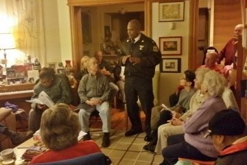  Captain Sekou Kinebrew meets with members of the Mt. Airy-Nippon-Bryan-Cresheim Town Watch. (Queen Muse/for NewsWorks) 