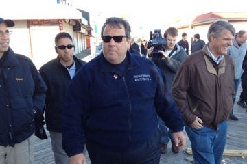 Gov. Christie tours the Seaside Heights boardwalk shortly after Sandy. (Scott Gurian/WYNC) 