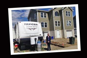  Andrea Kassimatis and her family of five are still living in a 37-foot trailer as they wait for contractors to finish building their new home. 