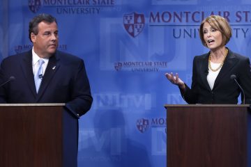  Gov. Chris Christie, left, listens as Democratic challenger Barbara Buono answers a question during their debate Tuesday, Oct. 15, 2013. (AP Photo/Mel Evans) 