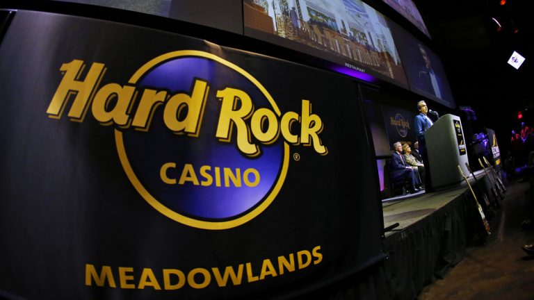 Jim Allen, chairman of Hard Rock International, talks about plans for Hard Rock and Meadowlands Racing & Entertainment as they unveil the future plans for Hard Rock Casino Meadowlands at the Meadowlands Racetrack in East Rutherford, N.J. Wednesday, June 3, 2015. (AP Photo/Rich Schultz)