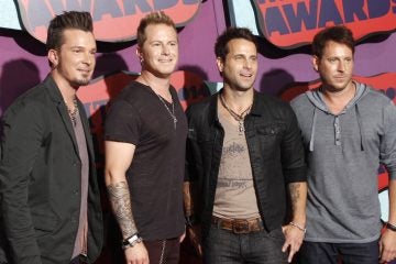  Josh McSwain, and from left, Scott Thomas, Barry Knox and Matt Thomas of Parmalee at the CMT Music Awards, June 4, 2014. (Photo by Wade Payne/Invision/AP) 