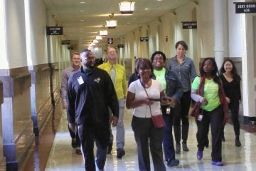  City Councilwoman Blondell Reynolds Brown leads a group of city workers on one of their twice-weekly walks along the corridors of  City Hall. (Tom MacDonald/WHYY)  