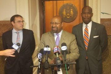  Philadelphia Mayor Michael Nutter announces his support for at-large City Council candidates Andrew Stober, left, and incumbent Derrick Green. The mayor is also backing incumbents Bill Greenlee and Blondell Reynolds Brown. (Tom MacDonald/WHYY)  