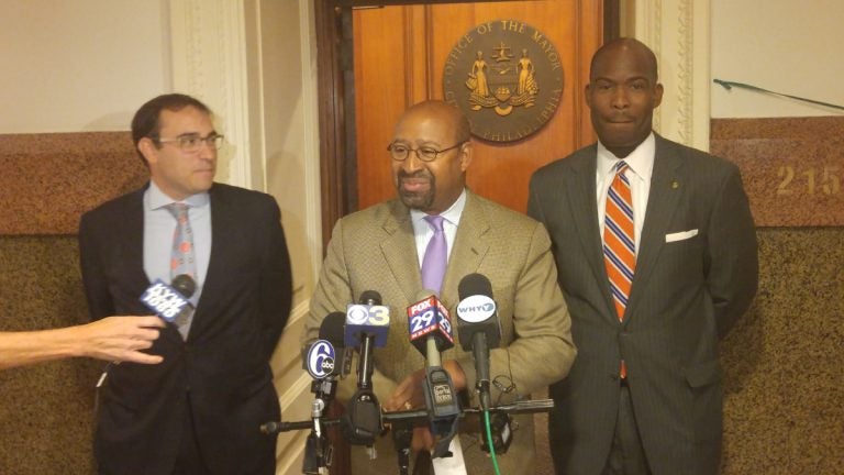  Philadelphia Mayor Michael Nutter announces his support for at-large City Council candidates Andrew Stober, left, and incumbent Derrick Green. The mayor is also backing incumbents Bill Greenlee and Blondell Reynolds Brown. (Tom MacDonald/WHYY)  