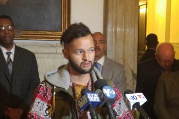 20151022_093502 College student Manny Martinez, previewing what Council members might hear, says for a person of limited means, earning a degree means overwhelming debt. (Tom MacDonald/WHYY)