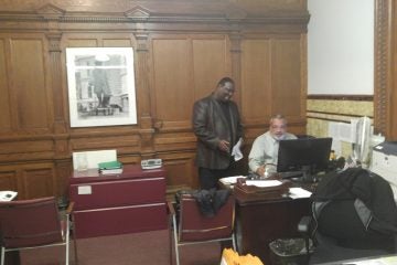 20151026_103348 Philadelphia City Commissioner Anthony Clark, left, was in his office on Monday. (Tom MacDonald/WHYY)