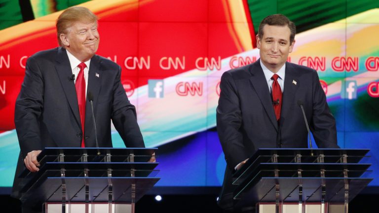  Donald Trump, left, and Ted Cruz react during the CNN Republican presidential debate at the Venetian Hotel & Casino on Tuesday, Dec. 15, 2015, in Las Vegas. (AP Photo/John Locher) 