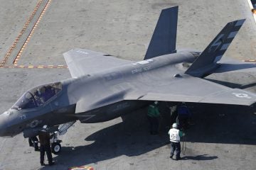  An F-35C Lightning II test aircraft taxies on the deck aboard the nuclear powered aircraft carrier USS Dwight D. Eisenhower of the coast of Norfolk, Va., Friday, Oct. 9, 2015. The aircraft is scheduled to be deployed in 2018. (AP Photo/Steve Helber, file) 