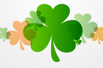 Happy St. Patrick's Day celebration background with clover leaves.