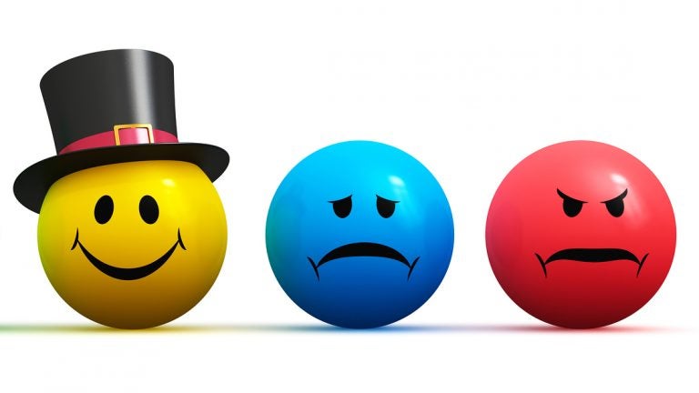 Color smiley faces emoticons with four different moods: happiness sadness anger and displeasure isolated on white background