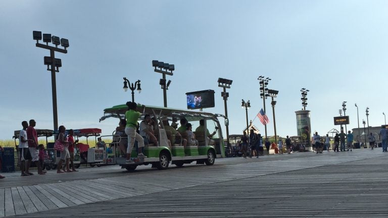 The Atlantic City Tram shuttles people up and down the Boardwalk. Alan Tu/WHYY