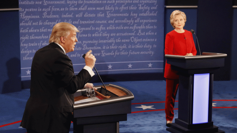 Republican presidential nominee Donald Trump gestures during the presidential debate with Democratic presidential nominee Hillary Clinton at Hofstra University in Hempstead