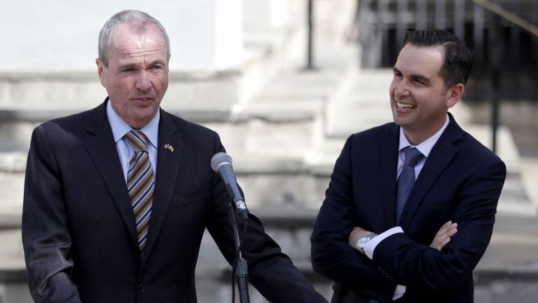 Phil Murphy (left) speaks after receiving the endorsement from Jersey City Mayor Steve Fulop.  (AP Photo/Julio Cortez)