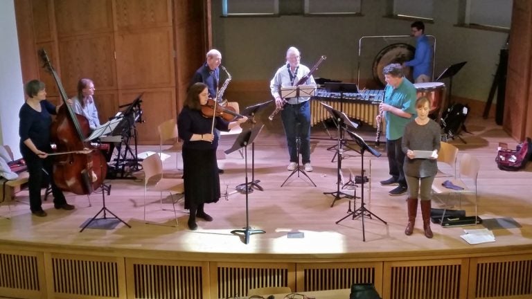 The Relâche ensemble rehearses for its performance of 'Sumer Redux' at the Penn Museum. (Peter Crimmins/WHYY)