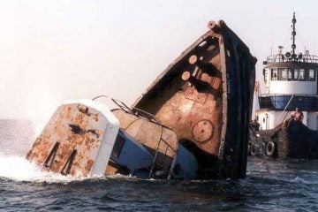 The sinking of Joan LaRie III on the Axel Carlson Reef in 2005. (Photo: New Jersey Division of Fish & Wildlife)