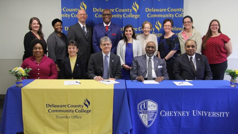 Delaware County Community College President Jerry Parker (center