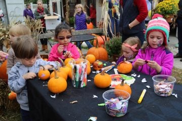Children got a chance to create their own mini-pumpkins with fall decorations (Natavan Werbock/for NewsWorks)