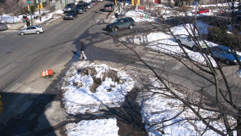  Snow piles at the corner of 48th Street and Baltimore Avenue in Philadelphia. (University City District) 