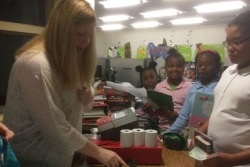 Harlan Elementary students received three free books at their book fair on Tuesday. (Zoë Read/WHYY).