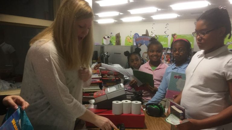 Harlan Elementary students received three free books at their book fair on Tuesday. (Zoë Read/WHYY).