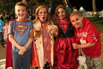  (From left to right) Jack, Maddie, Erin and Matthew from Cranberry Pines Elementary School happy to stay up late and watch the parade (Natavan Werbock/for NewsWorks) 