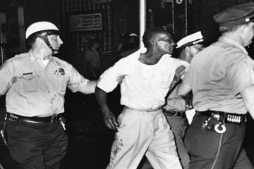  A man ins arrested at 22nd Street and Columbia Avenue. (Courtesy of Temple University Libraries, Urban Archives, George D. McDowell Philadelphia Evening Bulletin Photographs Collection) 