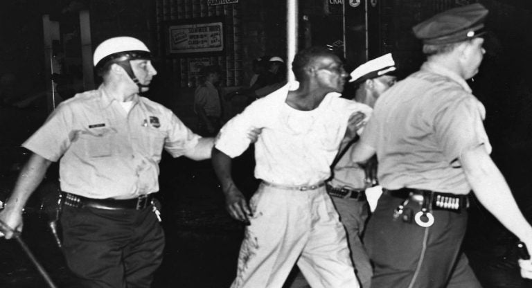  A man ins arrested at 22nd Street and Columbia Avenue. (Courtesy of Temple University Libraries, Urban Archives, George D. McDowell Philadelphia Evening Bulletin Photographs Collection) 