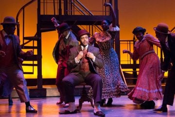  Derrick Cobey, center, as Coalhouse Walker Jr. and some of the ensemble in Bristol Riverside Theatre's production of 'Ragtime' (Photo courtesy of Mark Garvin) 
