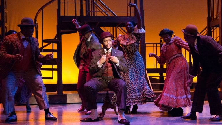  Derrick Cobey, center, as Coalhouse Walker Jr. and some of the ensemble in Bristol Riverside Theatre's production of 'Ragtime' (Photo courtesy of Mark Garvin) 