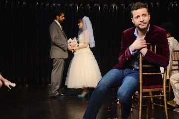  In the foreground, Justin Guarini, with John Caliendo and Kate Wetherhead in the background in Bucks County Playhouse's production of 'Company.' (Photo courtesy of Mandee Kuenzle)   