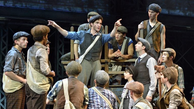  Dan DeLuca gives instructions to the striking newsboys in 'Newsies,' beginning its national tour at the Academy of Music. (Photo courtesy of Deen van Meer) 