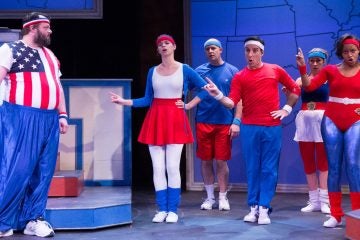  The cast of 1812 Productions' 'This Is the Week That Is,' cheering for their own political perspectives. From left (left position, not necessarily political perspective): Scott Greer, Tabitha Allen, Don Montrey, Dave Jadico, Susan Riley Stevens and Aimé Donna Kelly. (Photo courtesy of Mark   