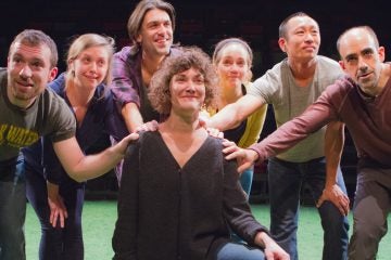  The members of Team Sunshine Performance Corporation's 'The Sincerity Project' at FringeArts: In the center is Melissa Krodman. The other cast members, who have her back, from left: Ben Camp, Jenna Horton, Mark McCloughan, Rachel Camp, Makoto Hirano and Aram Aghazarian. 