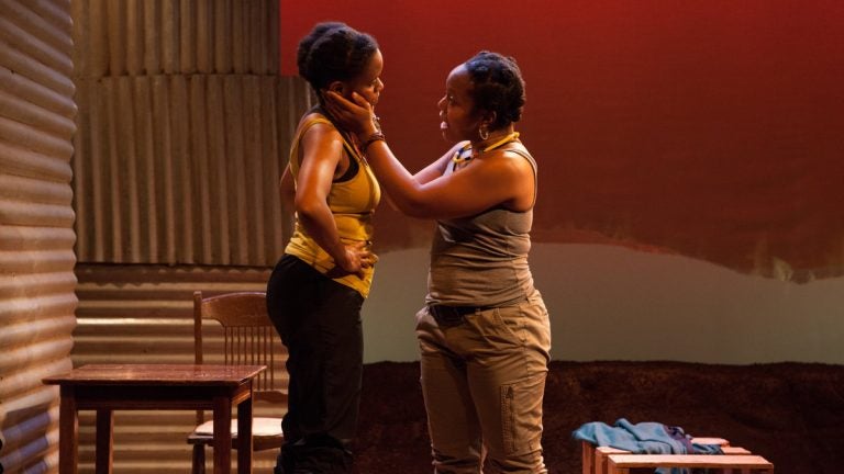  Aimé Donna Kelly (left) and Lynnette R. Freeman in InterAct Theatre Company's world-premiere production of 'The Dangerous House of Pretty Mbane,' a play it commissioned. (Photo courtesy of Kate Raines/Plate3Photography) 