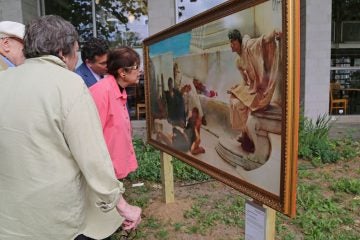 Visitors are able to get close and even touch the replica paintings such as this one (Natavan Werbock/for NewsWorks)