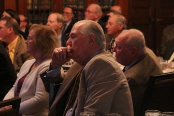 Vidocq Society members listen thoughtfully while the detectives present their case. (Emma Lee/WHYY)