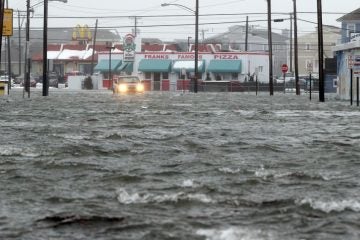 Water floods New Jersey Avenue in North Wildwood