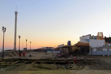  The Sawmill Cafe, the southernmost building on the Seaside boardwalk, is now clearly visible from the trench that was dug at Lincoln Avenue to stop the fire from advancing northward. The numerous buildings that once blocked a clear view to the south have been demolished. JSHN contributor Kevin Michelson snapped this image at sunset on October 21, 2013.  