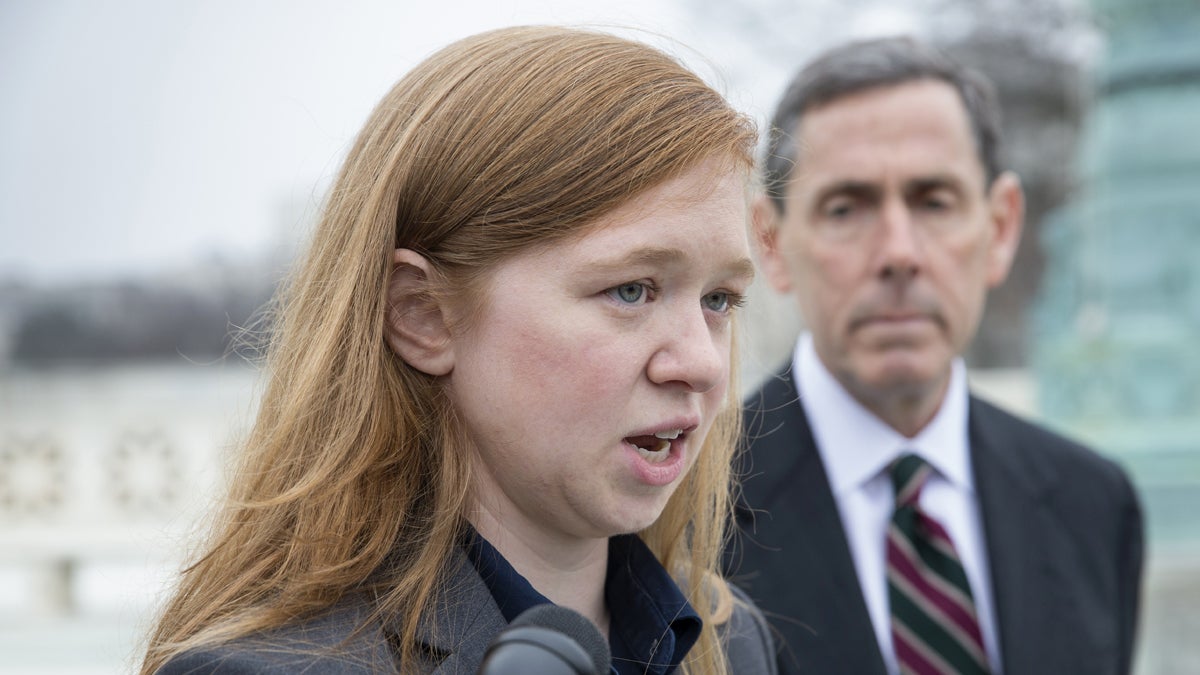  Abigail Fisher, who challenged the use of race in college admissions, joined by lawyer Edward Blum, right, speaks to reporters outside the Supreme Court in Washington on Dec. 9, 2015.  (AP Photo/J. Scott Applewhite) 