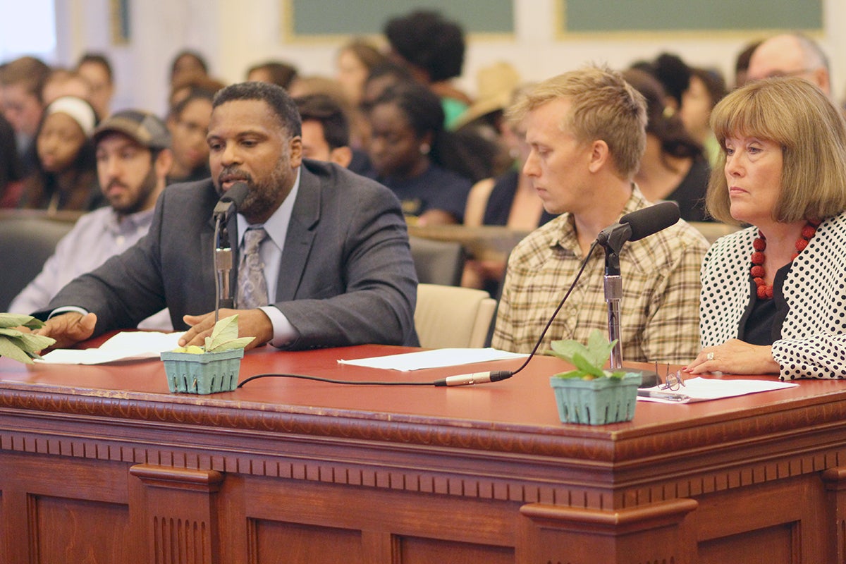 Urban garden supporters talk about their work at a Wednesday City Council hearing.
They (from left) Jerome Shabazz