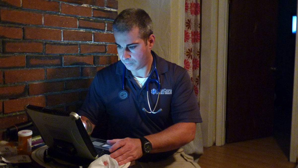 Paramedic Joe Sequeira makes house calls in an attempt to keep patients out of the emergency room. (Todd Bookman/WHYY)