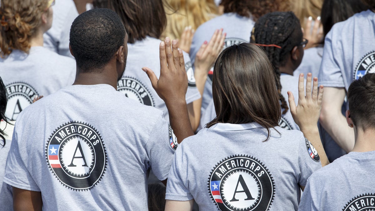 Hundreds of new volunteers are sworn in for duty at a ceremony marking the 20th anniversary of the AmeriCorps national service program in 2014. (AP Photo/J. Scott Applewhite)