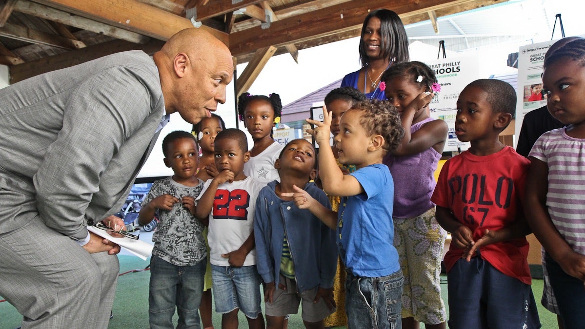  Superintendent William Hite is joined by Montgomery Early Learning Center's students in West Philadelphia at an announcement of a new website that will help parents find high quality Pre-K programs in Philadelphia. (Kimberly Paynter/WHYY) 
