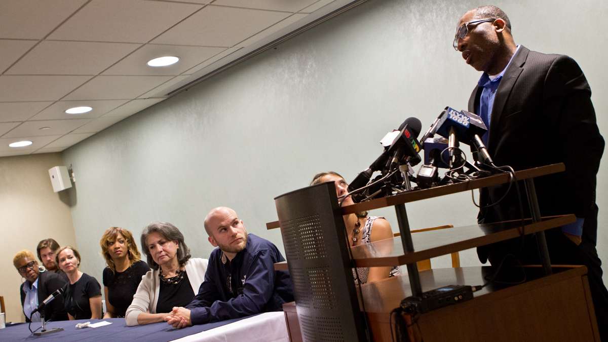 Anthony Wright, 45, was acquitted of the 1993 murder of Louise Talley, 77, and released from prison Tuesday evening. Wright speaks to press Wednesday with the jury who rendered the not-guilty verdict by his side. (Kimberly Paynter/WHYY)